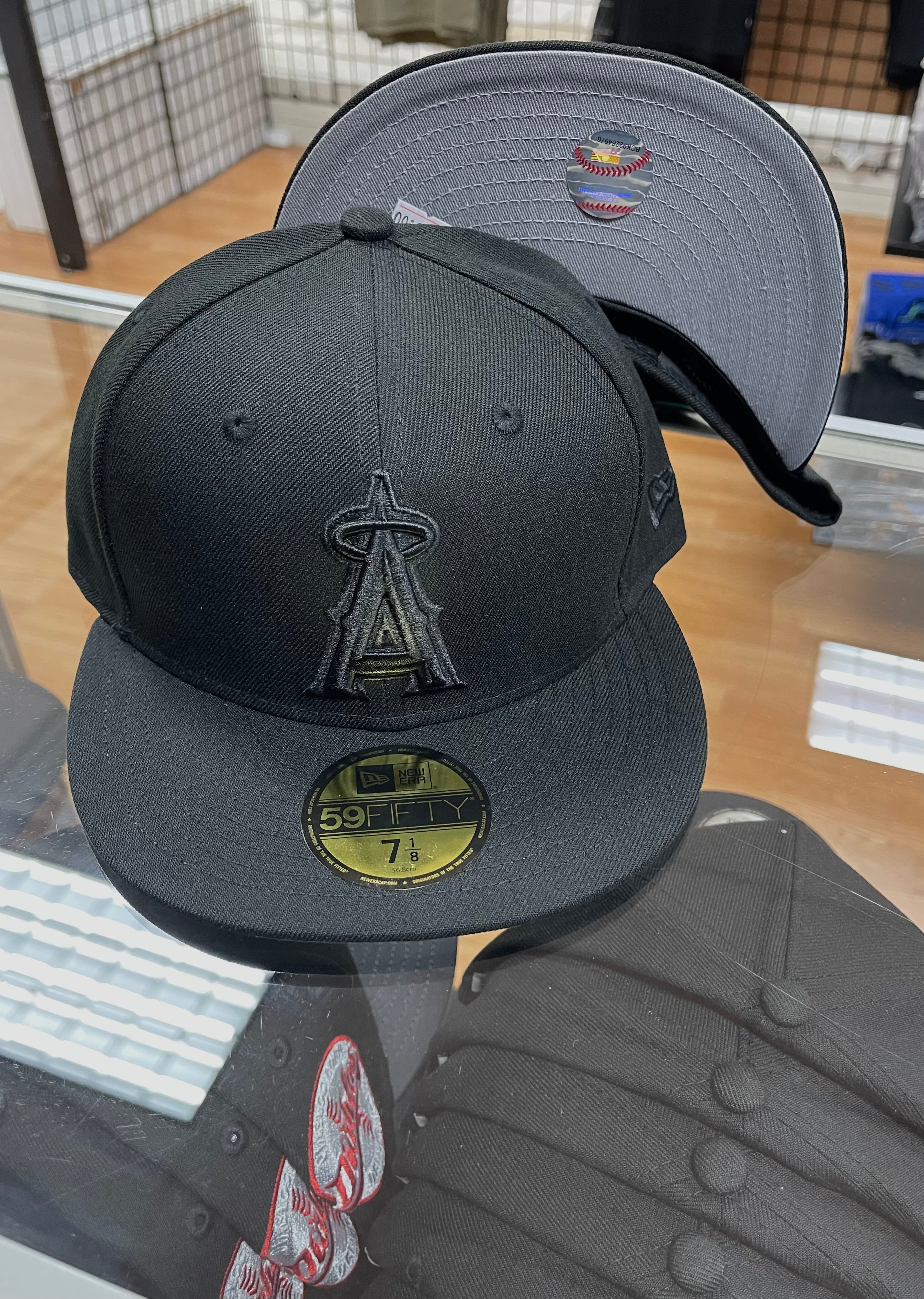 Angels all black fitted hat